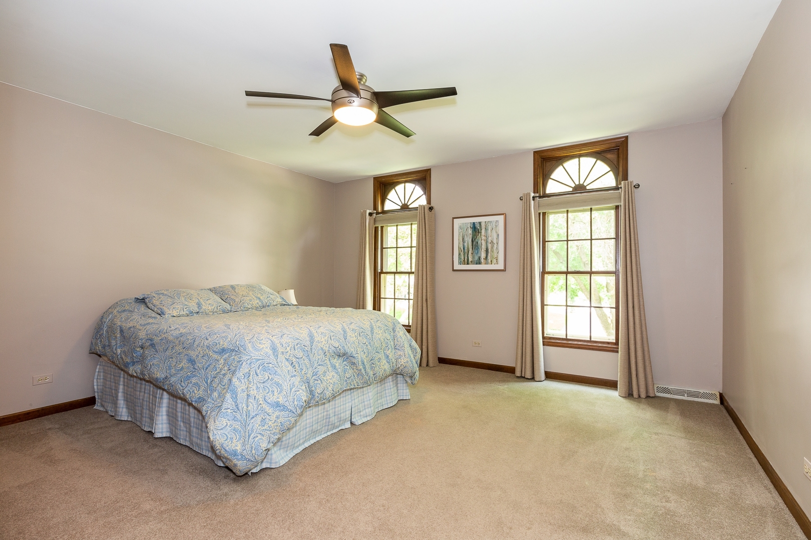 620 Buttonwood Circle Naperville, IL 60540 - Photo 17 of 29 a spacious bedroom with a bed and a window