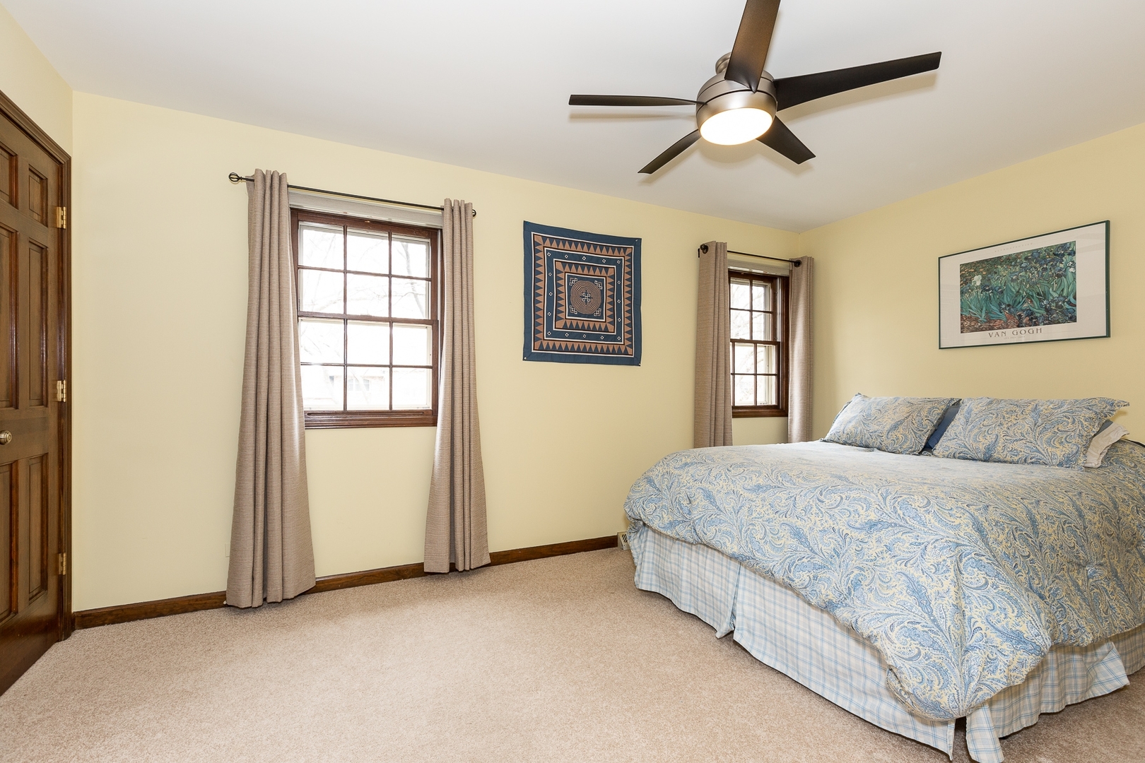620 Buttonwood Circle Naperville, IL 60540 - Photo 18 of 29 a spacious bedroom with a bed and a window