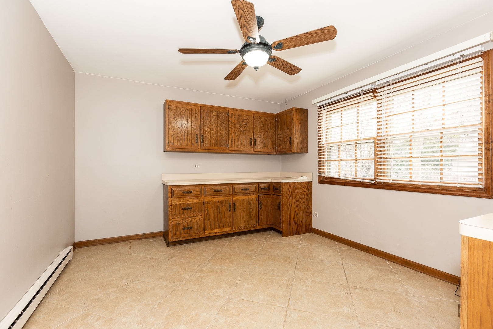 620 Buttonwood Circle Naperville, IL 60540 - Photo 21 of 29 a kitchen with stainless steel appliances granite countertop a stove a sink and a microwave