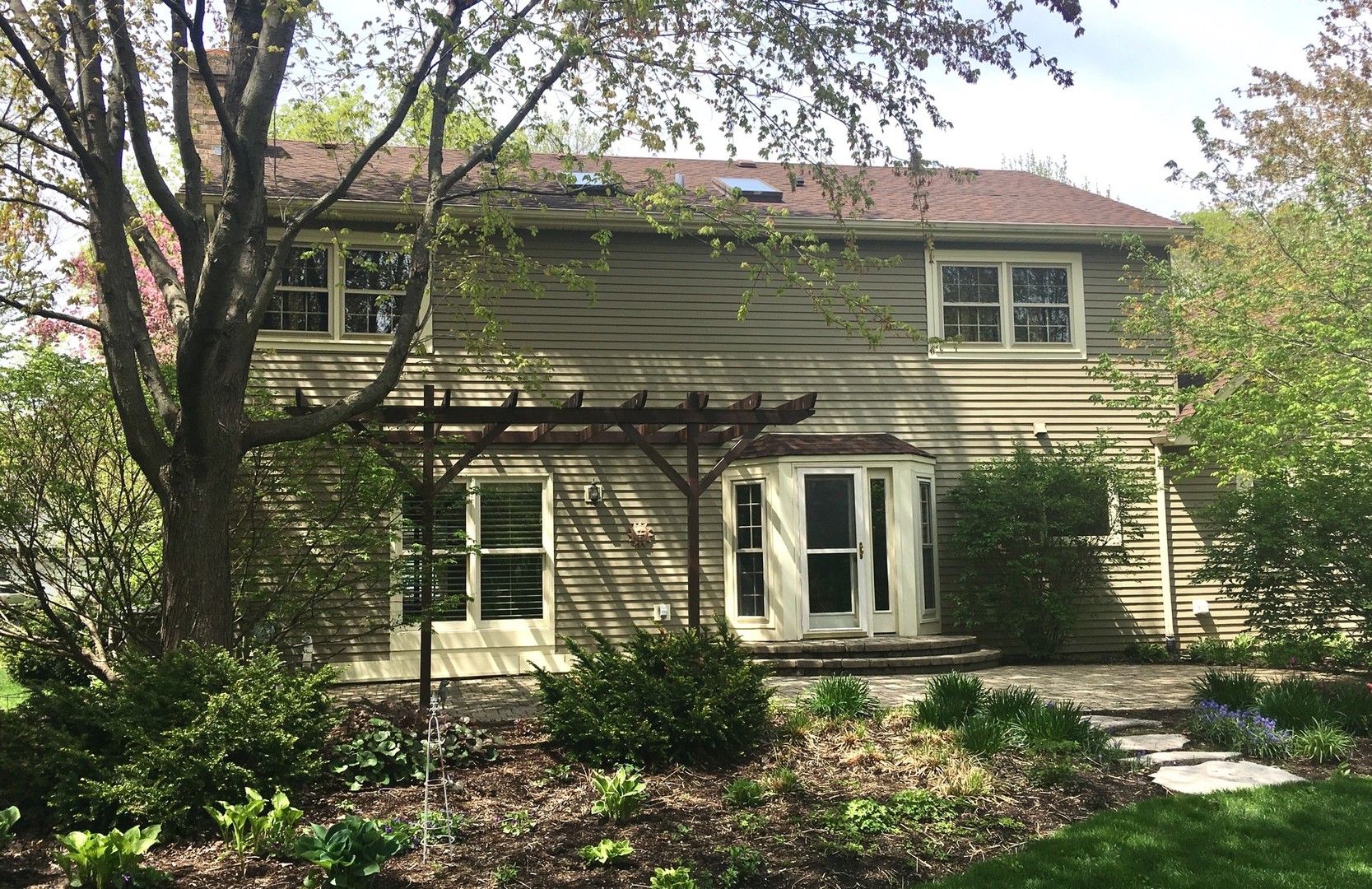 620 Buttonwood Circle Naperville, IL 60540 - Photo 24 of 29 front view of a house with a yard