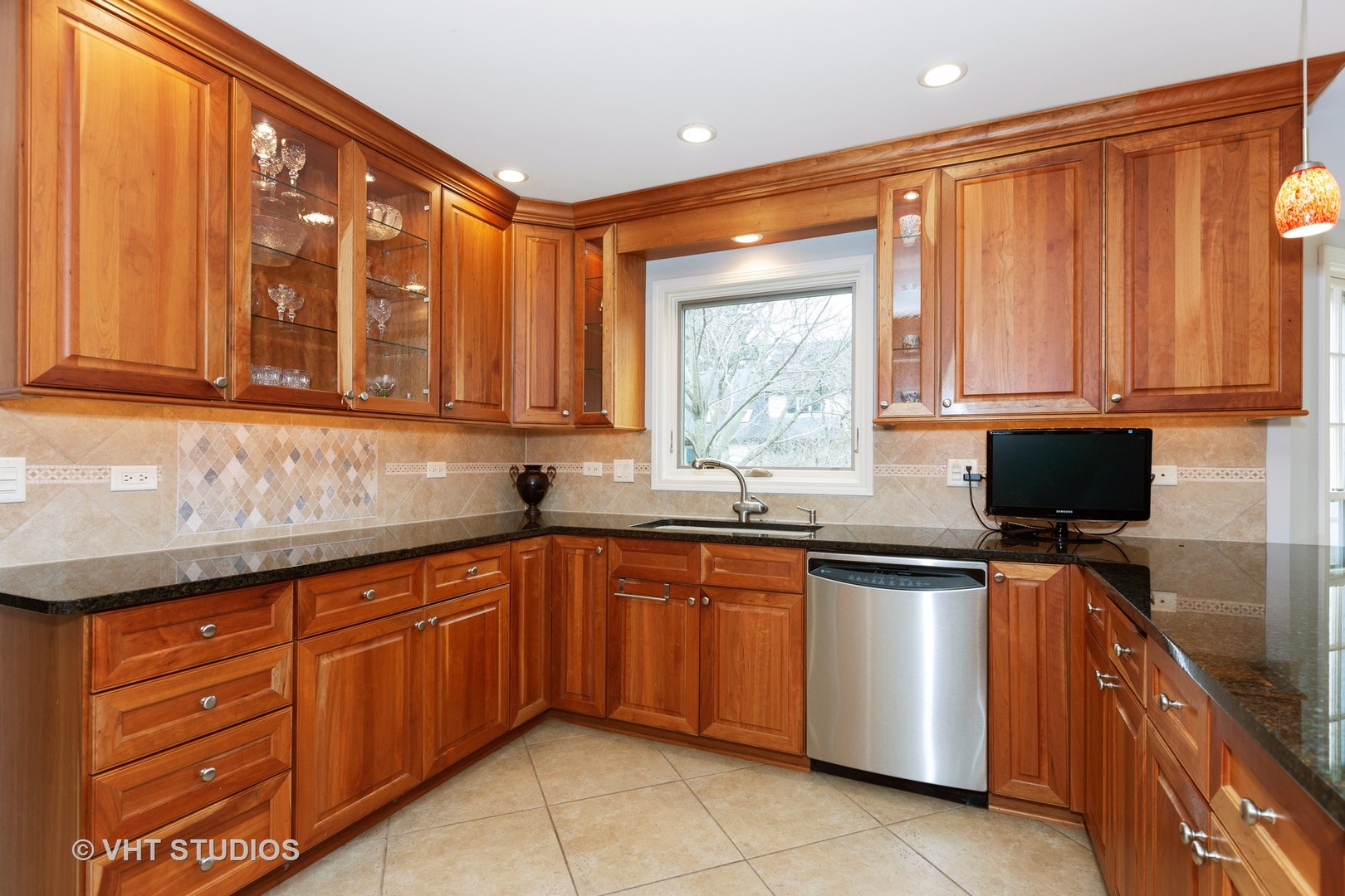 620 Buttonwood Circle Naperville, IL 60540 - Photo 4 of 29 a kitchen with a sink stove and cabinets