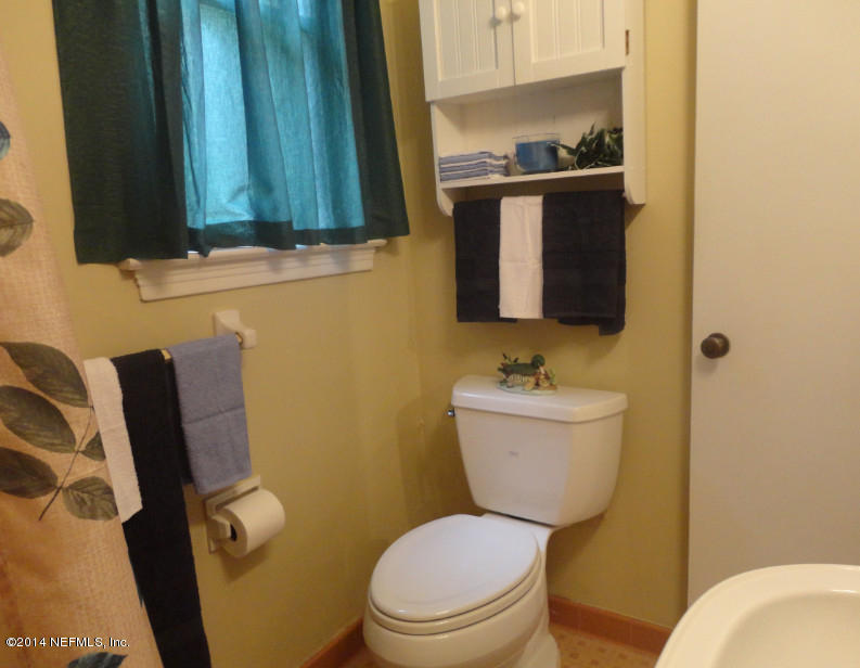 1424 Bassett Road Jacksonville, FL 32208 - Photo 30 of 43 bath toilet