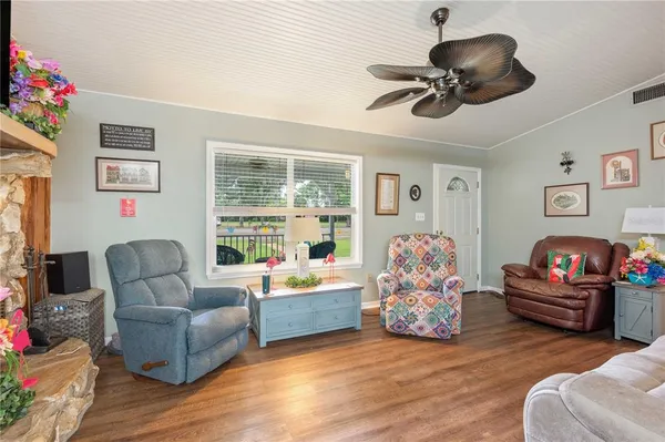 a kitchen with stainless steel appliances kitchen island a stove and a refrigerator