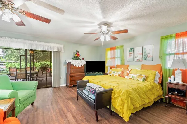 a bathroom with a sink a toilet and shower curtain
