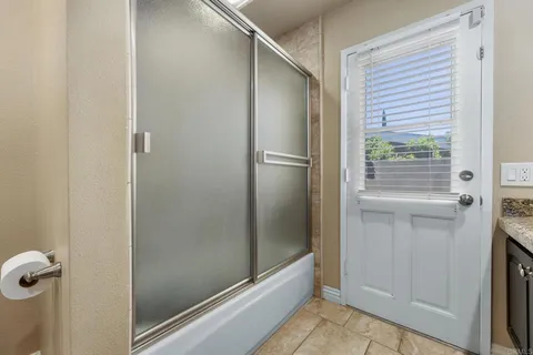a view of a room with white doors