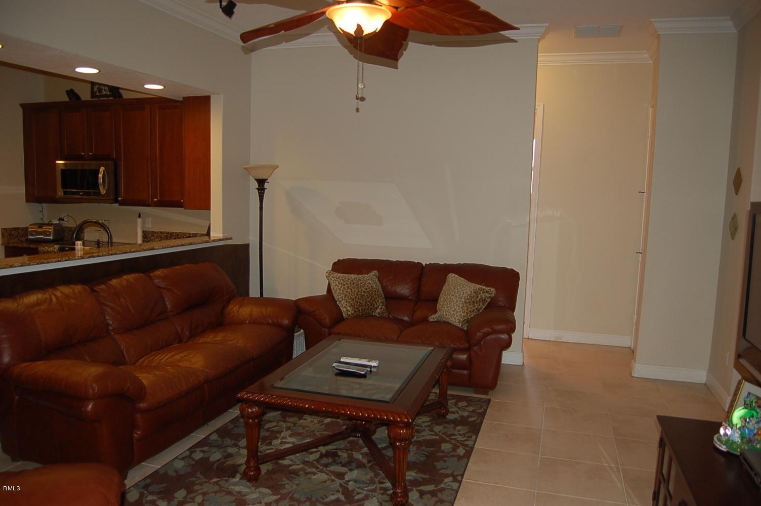 3851 Southwest Crary Street Port St. Lucie, FL 34953 - Photo 17 of 37 Large, tiled family room.