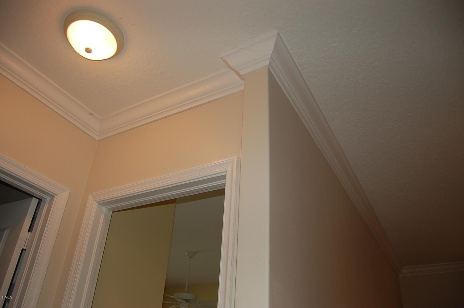3851 Southwest Crary Street Port St. Lucie, FL 34953 - Photo 35 of 37 Crown Molding