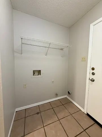 a view of a room with racks on the wall