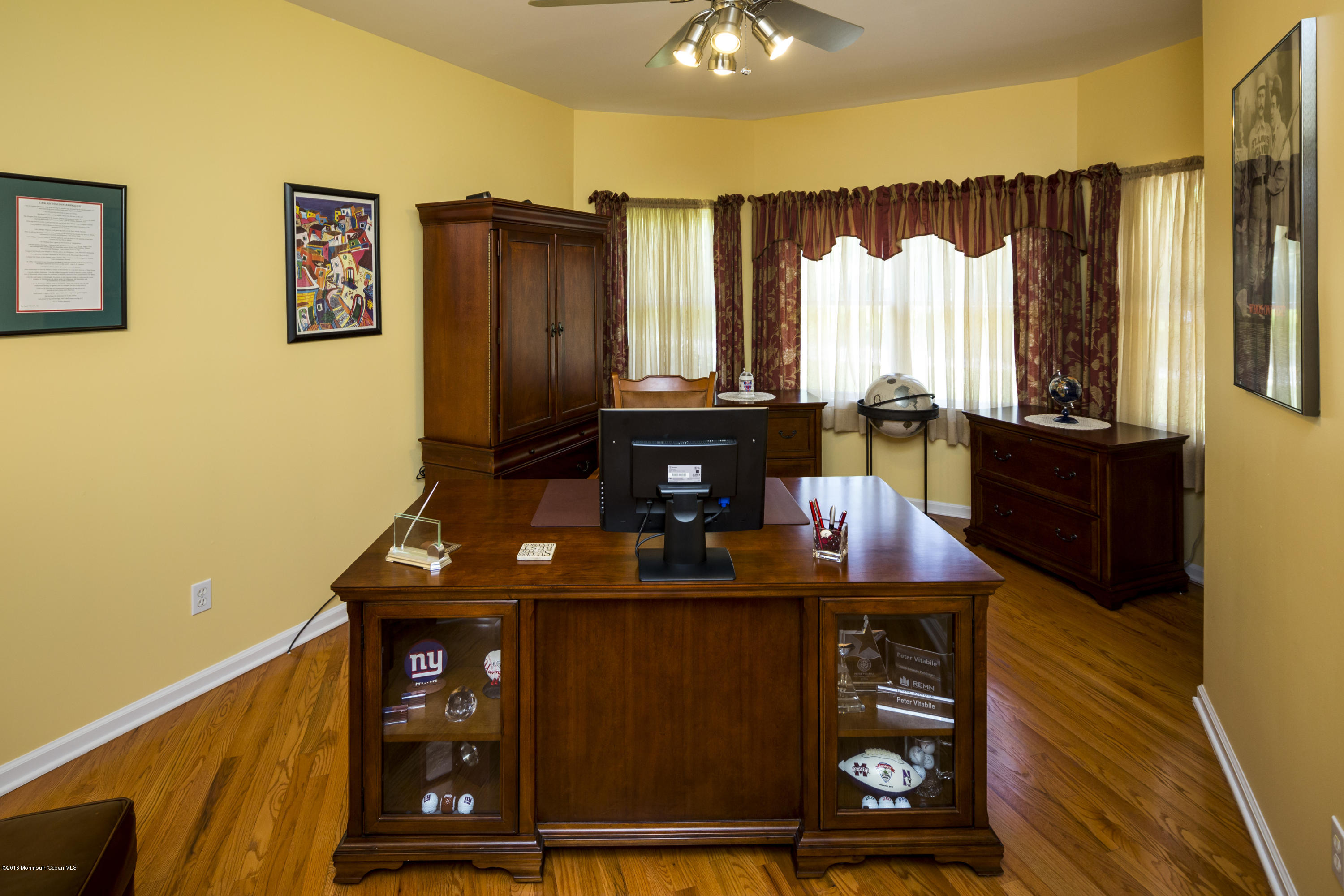 55 Spring Road Clarksburg, NJ 08510 - Photo 11 of 44 a living room with furniture a window and a flat screen tv
