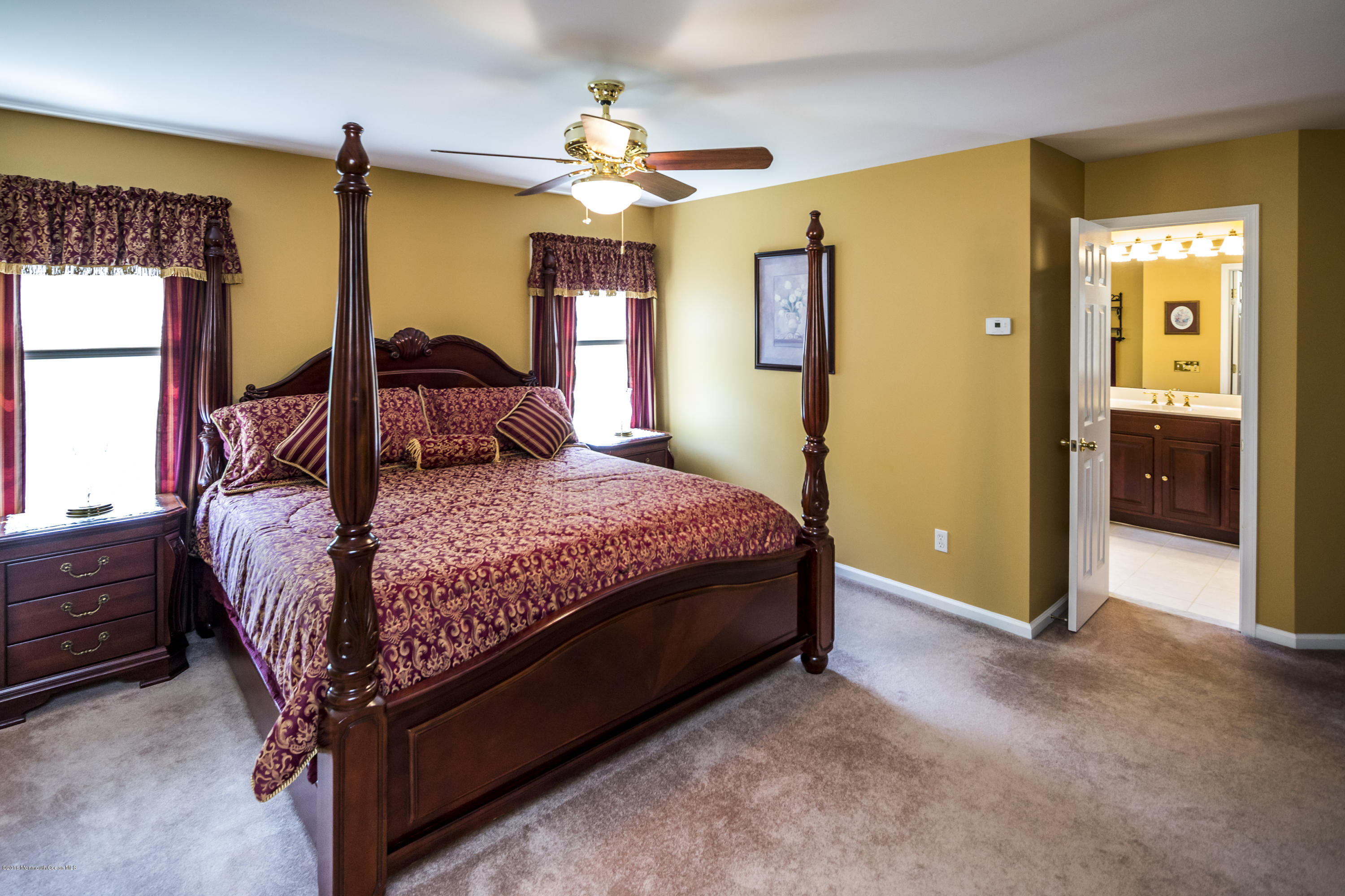 55 Spring Road Clarksburg, NJ 08510 - Photo 32 of 44 a bedroom with a bed and window