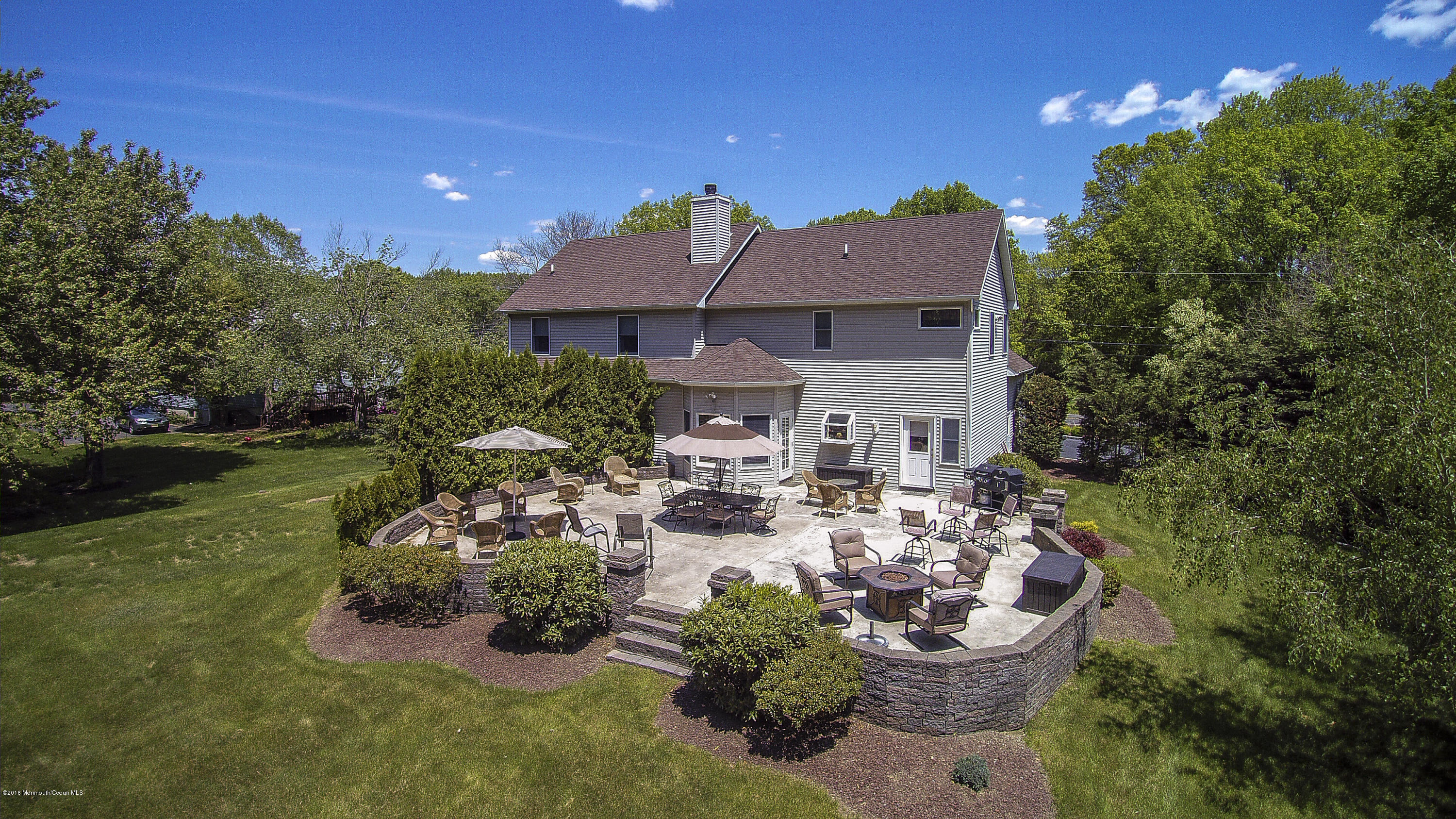 55 Spring Road Clarksburg, NJ 08510 - Photo 40 of 44 a view of a house with backyard and sitting area