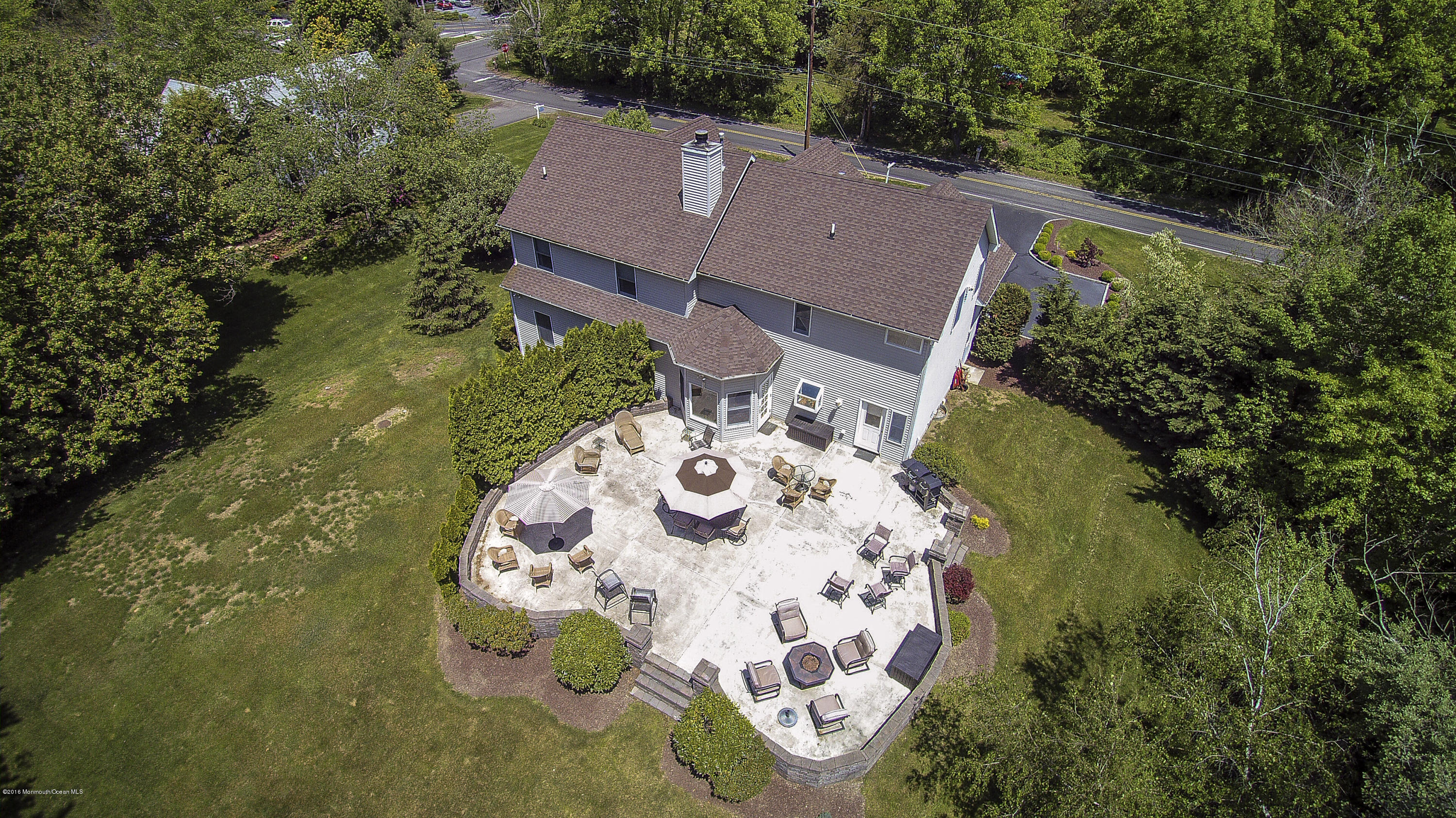 55 Spring Road Clarksburg, NJ 08510 - Photo 41 of 44 an aerial view of a house with a swimming pool