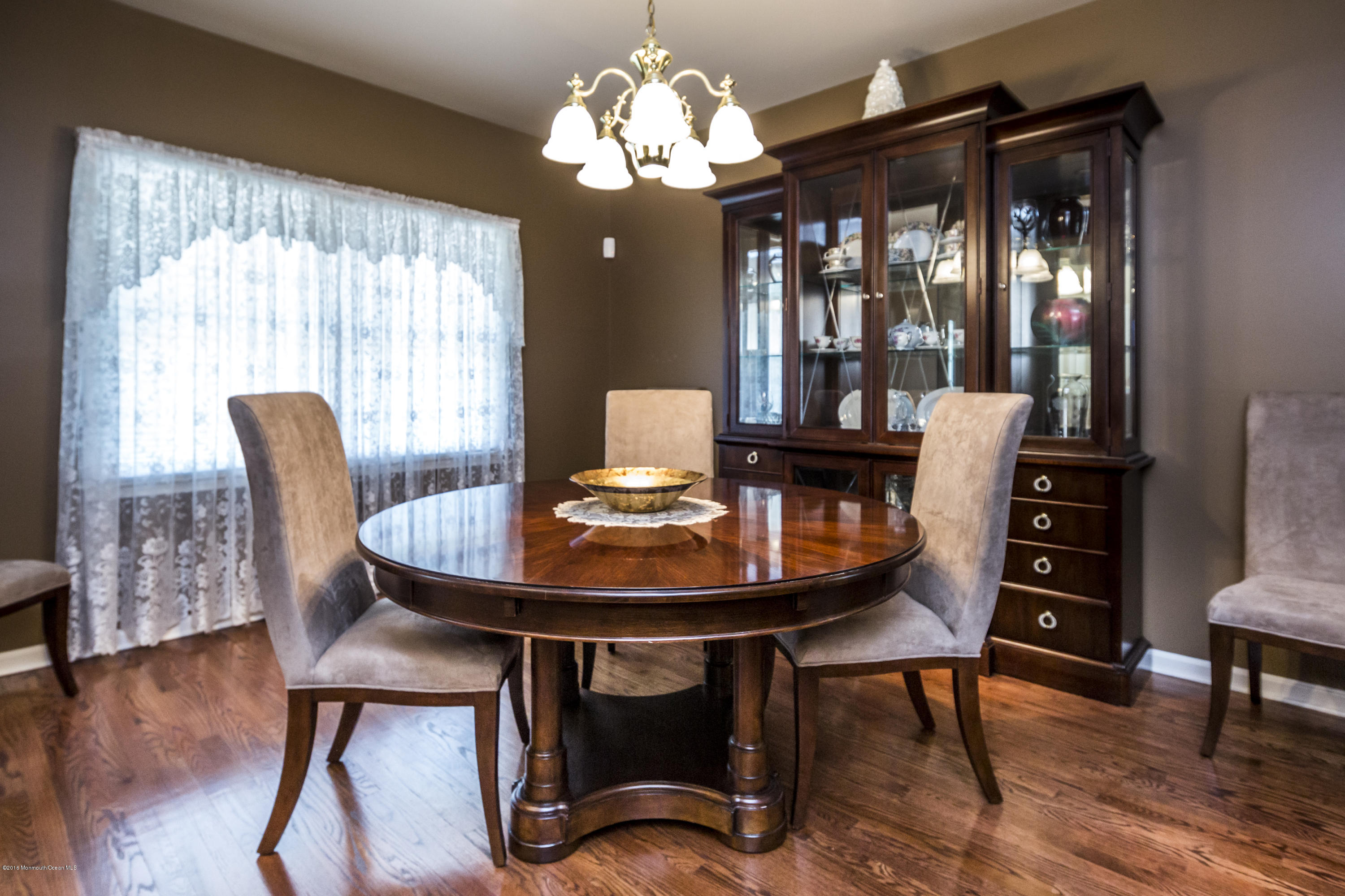 55 Spring Road Clarksburg, NJ 08510 - Photo 10 of 44 a view of a dining room with furniture window and wooden floor