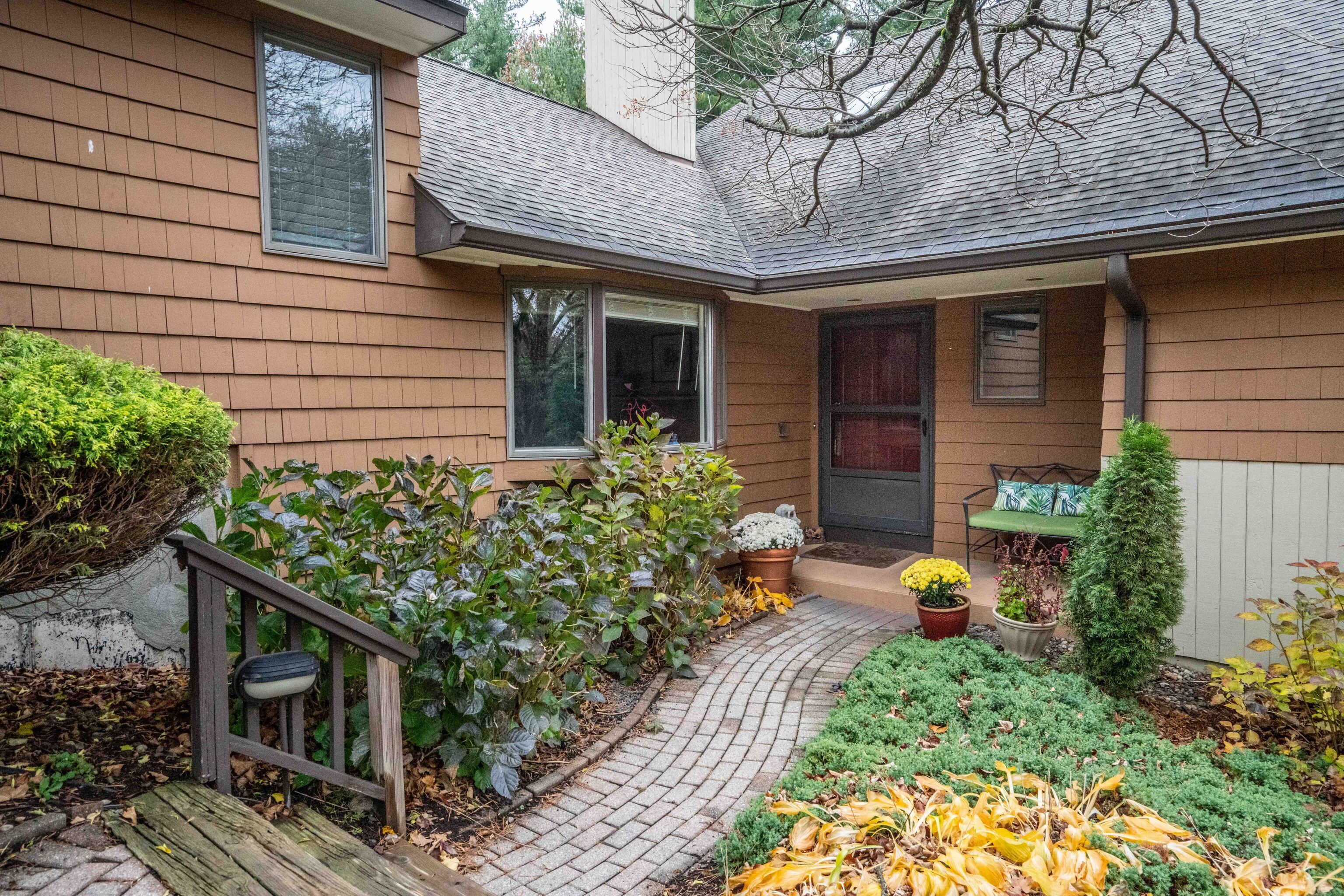 34 Cary Lane, Unit 34 Bloomfield, CT 06002 - Photo 21 of 40 a front view of a house with garden