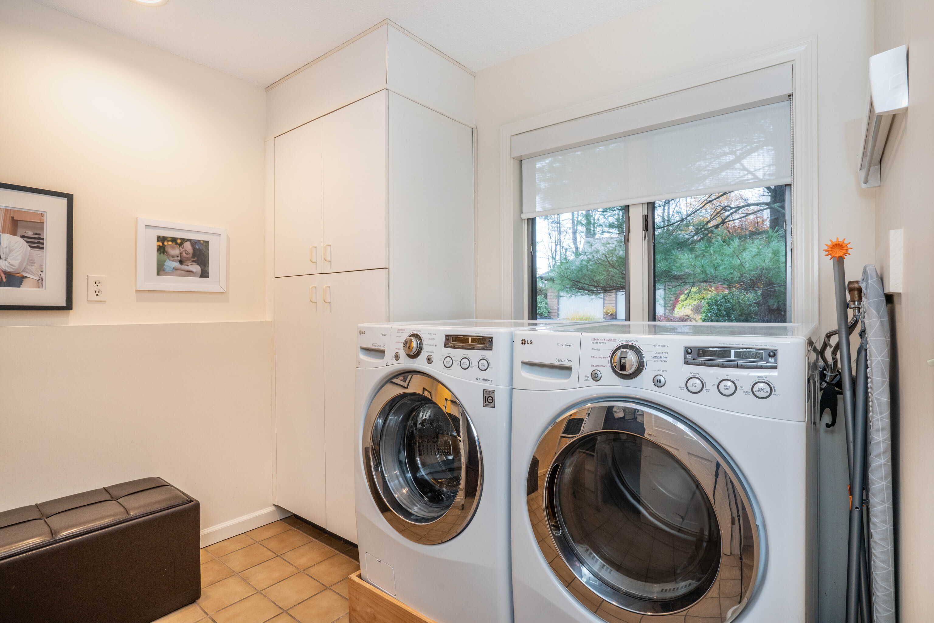 34 Cary Lane, Unit 34 Bloomfield, CT 06002 - Photo 27 of 40 a view of washer and dryer with bathroom in the background