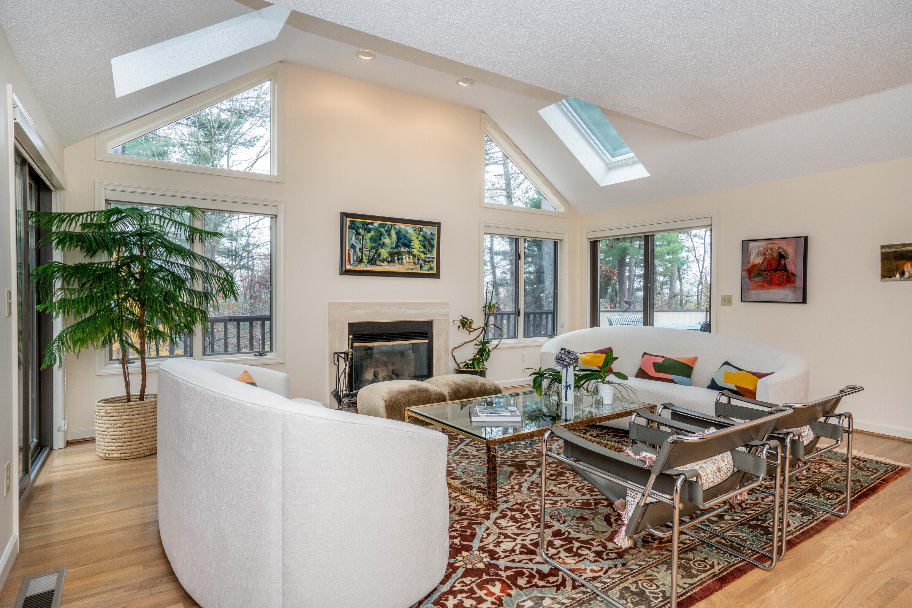 34 Cary Lane, Unit 34 Bloomfield, CT 06002 - Photo 3 of 40 a living room with furniture a fireplace and a large window