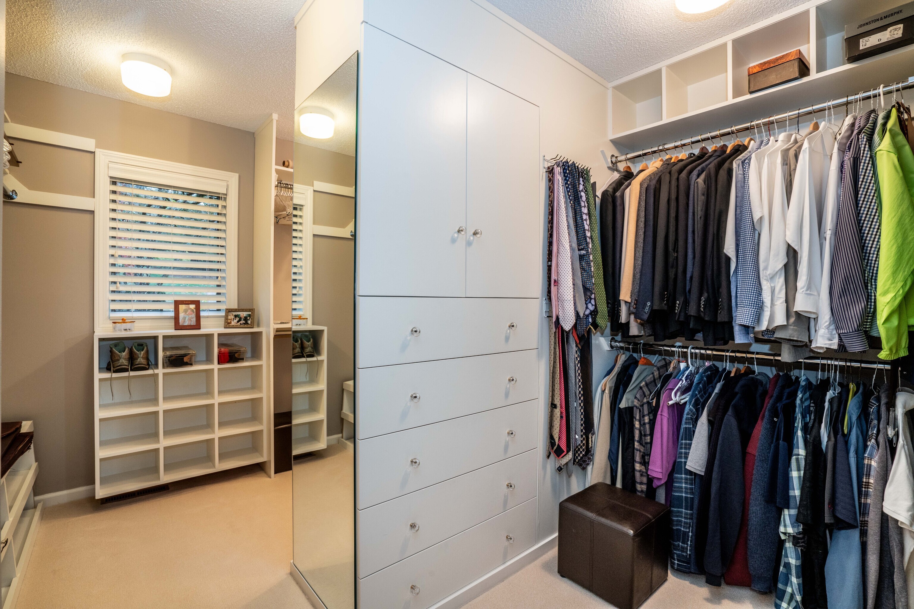 34 Cary Lane, Unit 34 Bloomfield, CT 06002 - Photo 34 of 40 a view of walk in closet with clothes and shoes