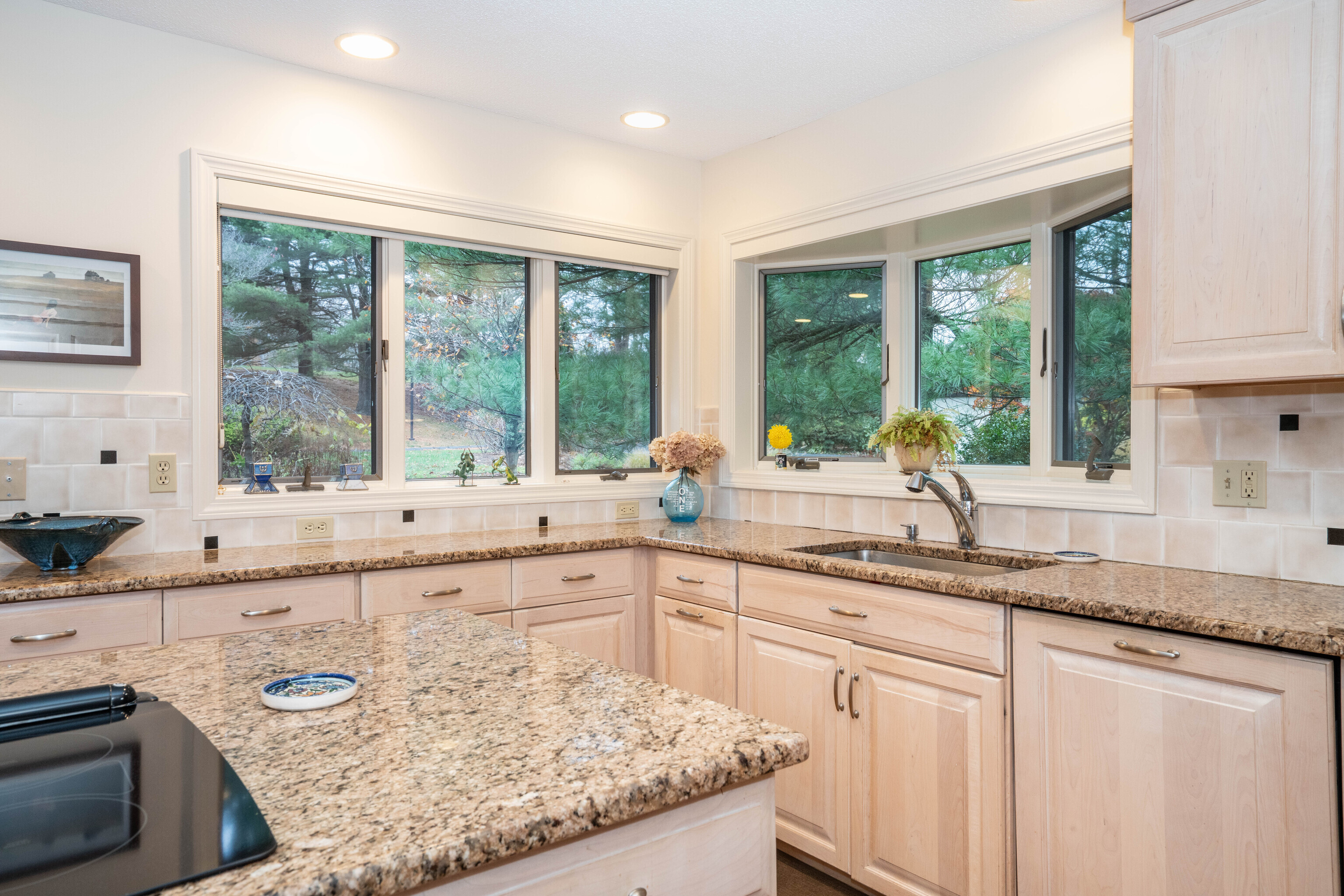 34 Cary Lane, Unit 34 Bloomfield, CT 06002 - Photo 7 of 40 a kitchen with stainless steel appliances granite countertop a sink and a stove