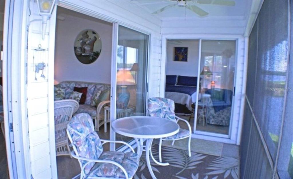 Undisclosed Address Bradenton, FL 34209 - Photo 13 of 27 a view of a livingroom with furniture and a fan