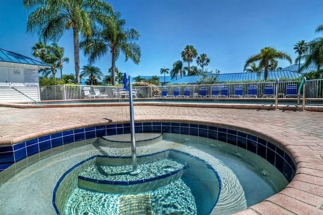 a view of a swimming pool with a patio