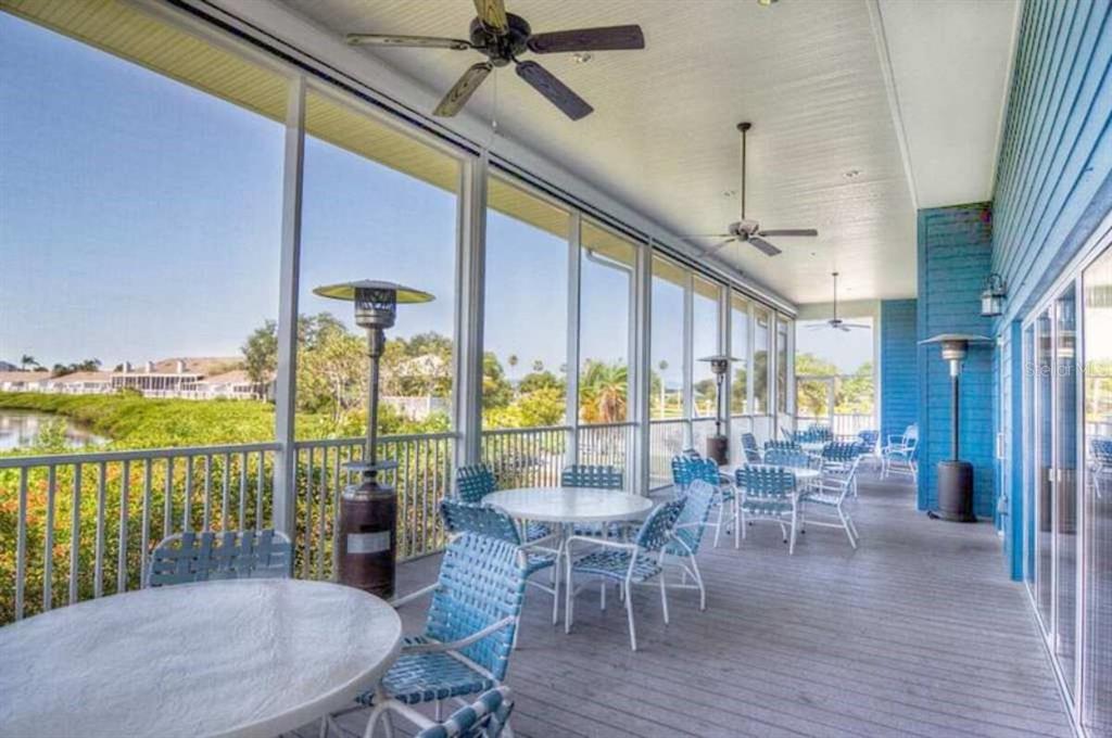 Undisclosed Address Bradenton, FL 34209 - Photo 25 of 27 a view of a dining room with furniture window and wooden floor