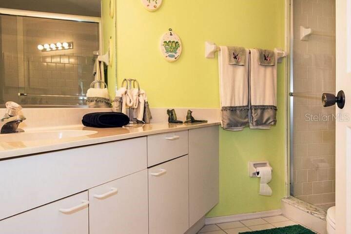 Undisclosed Address Bradenton, FL 34209 - Photo 5 of 27 a bathroom with a sink and a mirror