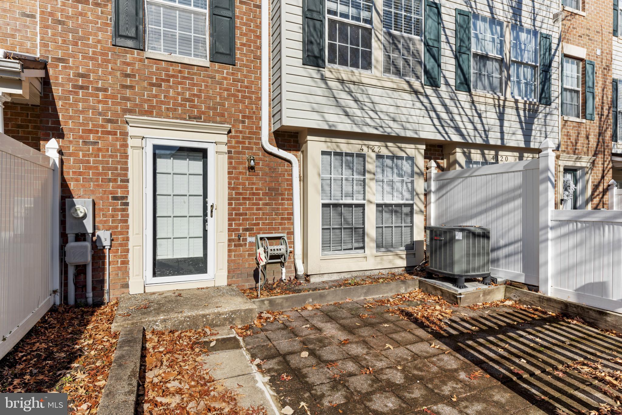 4122 Maple Path Circle, Unit 55 Nottingham, MD 21236 - Photo 26 of 27 Charming brick facade with private patio space.