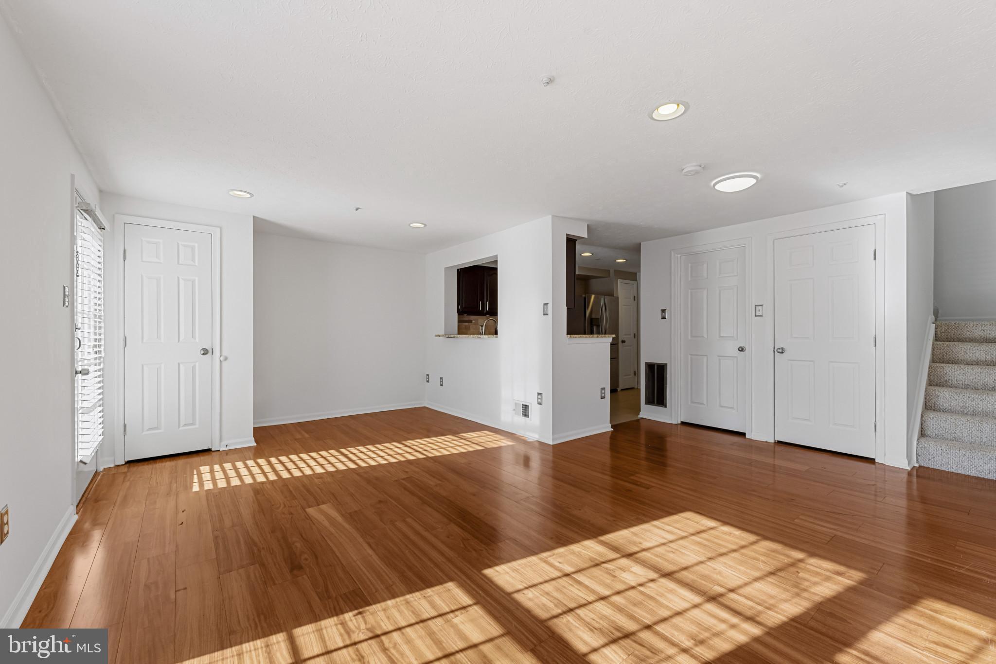 4122 Maple Path Circle, Unit 55 Nottingham, MD 21236 - Photo 8 of 27 Bright and airy open space with warm tones.