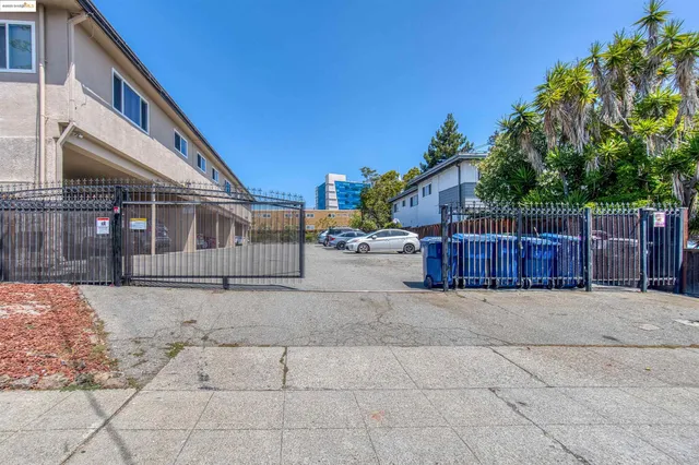 a view of backyard with deck and seating space