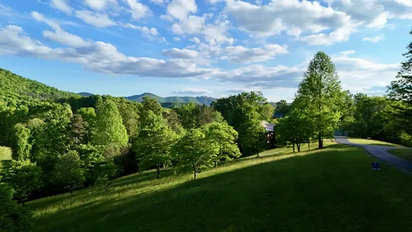 a view of an outdoor space and a yard