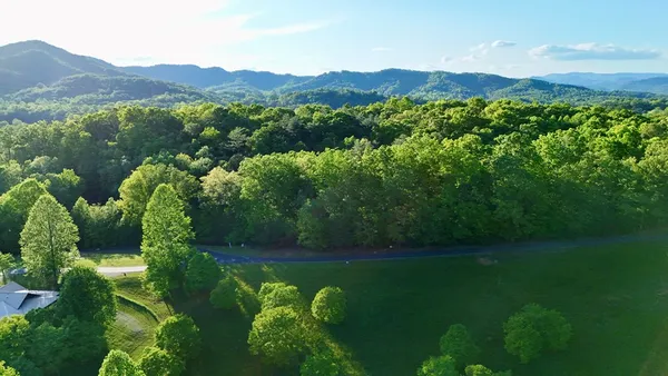 a view of an outdoor space with a lake view