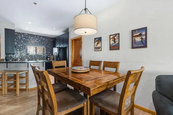 a view of a dining room with furniture