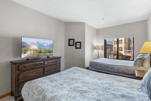 a bathroom with a sink toilet and mirror
