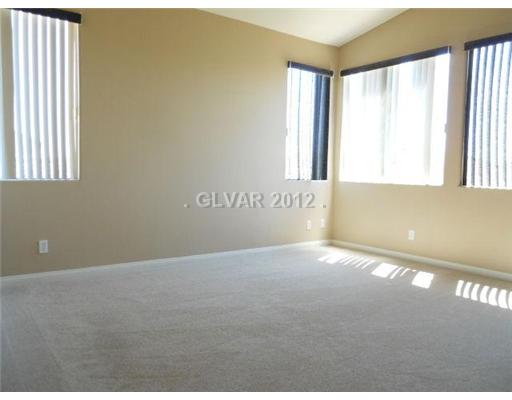 9745 Manheim Lane Las Vegas, NV 89117 - Photo 9 of 16 Master Bedroom.