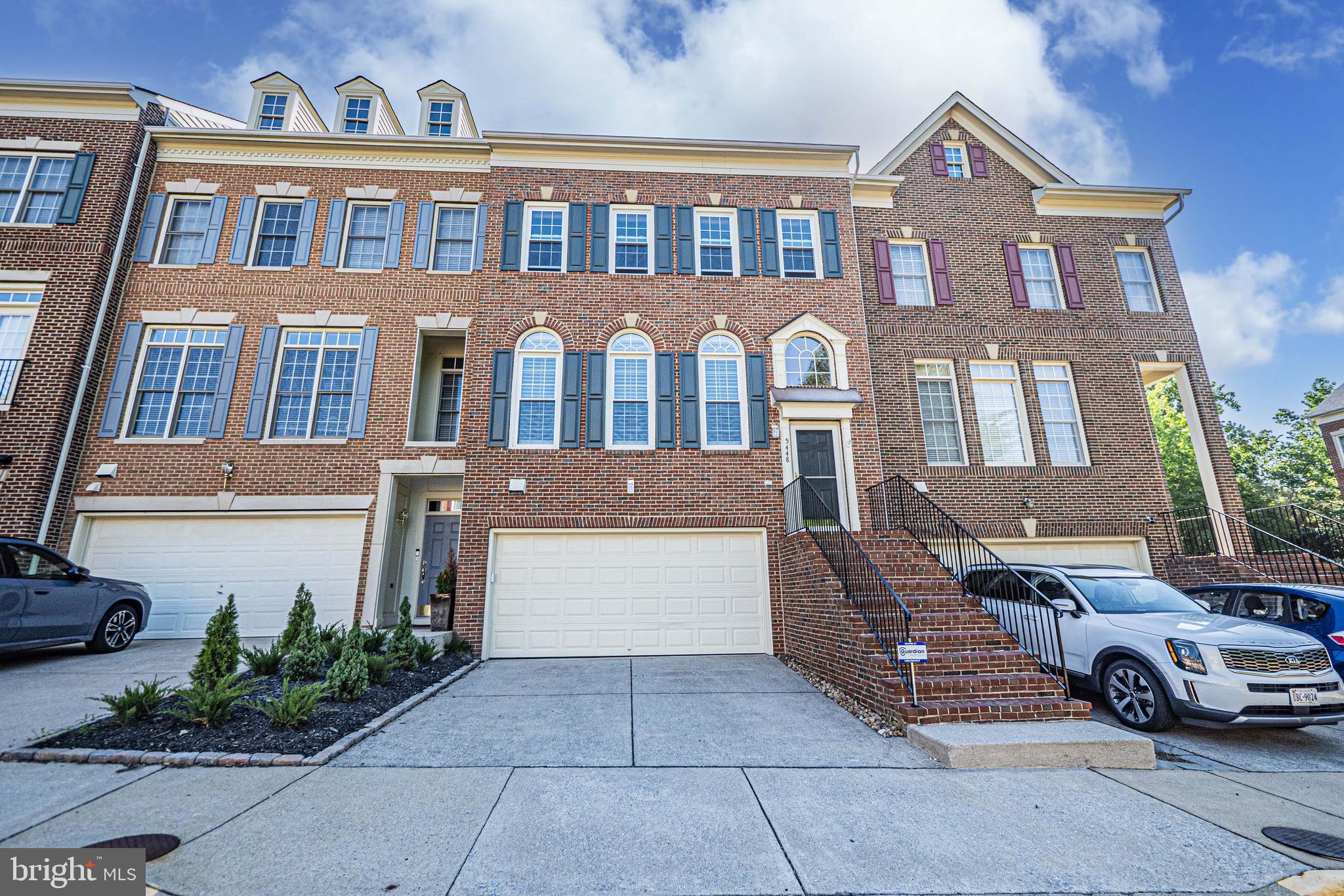 5448 Edsall Ridge Place Alexandria, VA 22312 - Photo 2 of 52 a front view of a house with outdoor space