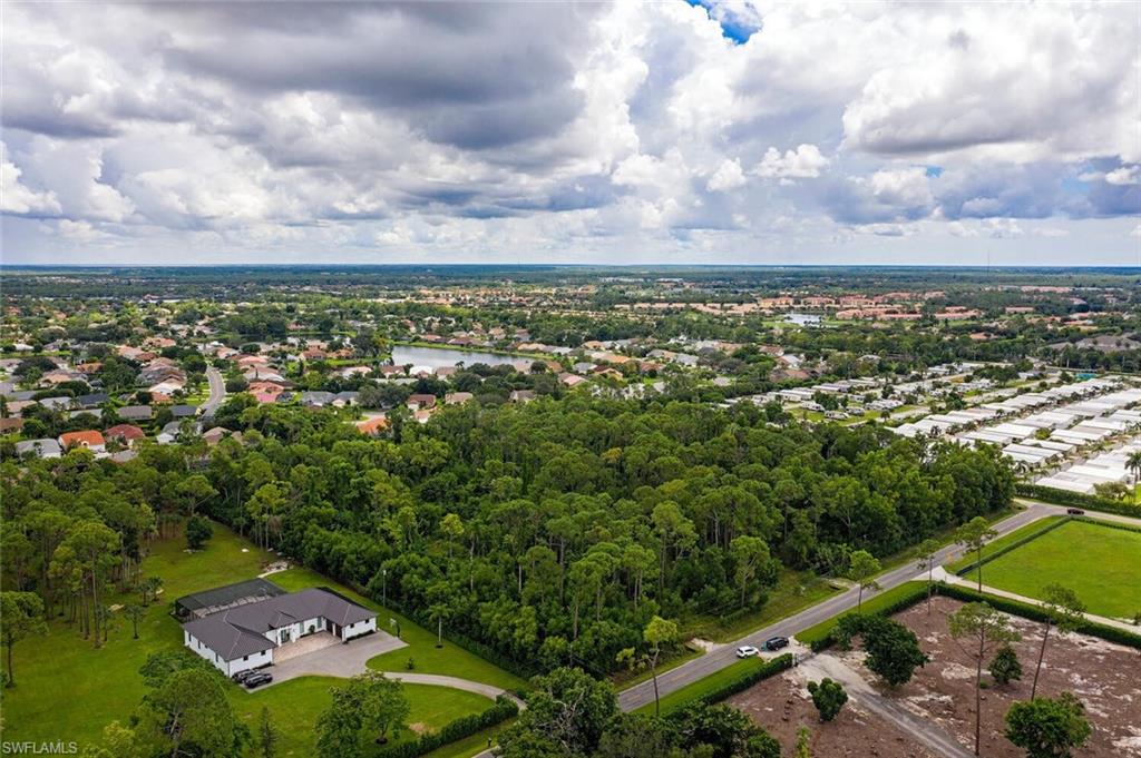 771 St Clair Shores Road Naples, FL 34104 - Photo 3 of 3 an aerial view of a city