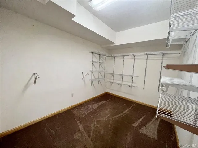 a view of a room with rack on the wall