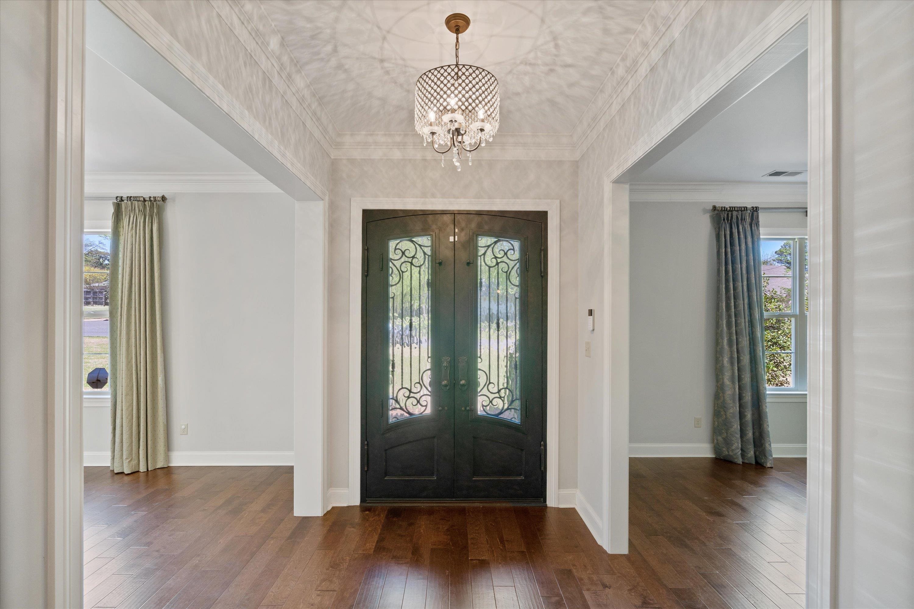 5168 Barry Road Memphis, TN 38117 - Photo 2 of 25 wooden floor in an empty room with a window