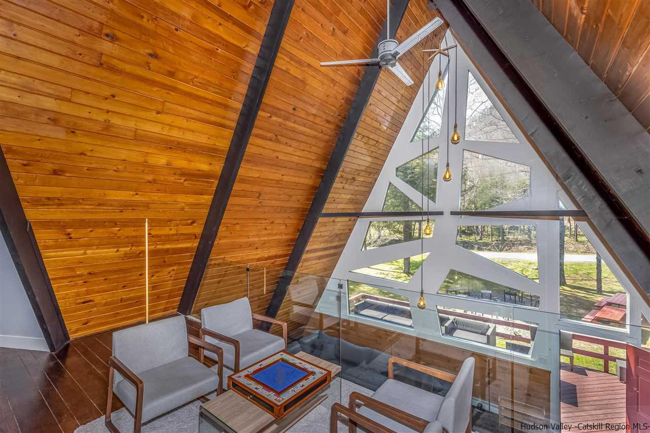 96 Lake Road Hunter, NY 12442 - Photo 11 of 35 a view of an outdoor sitting area