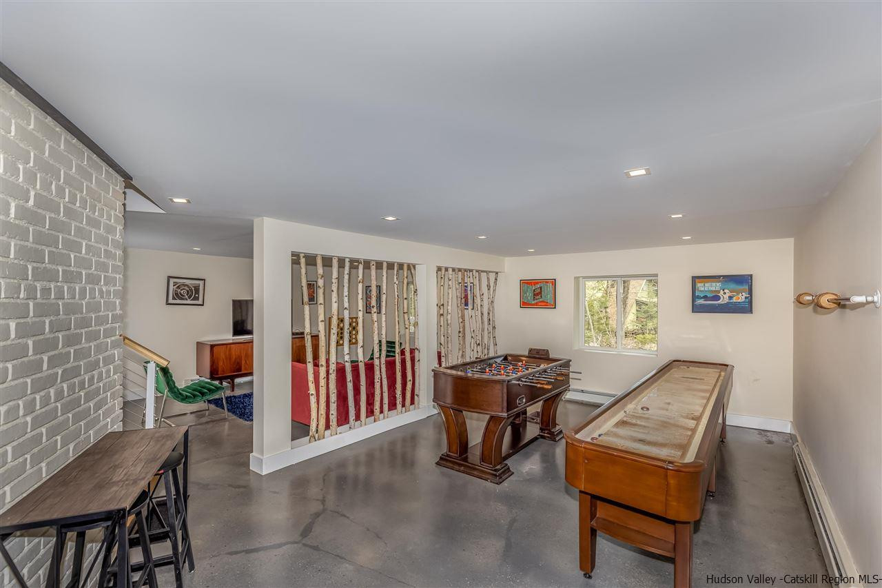 96 Lake Road Hunter, NY 12442 - Photo 16 of 35 a living room with furniture and a window