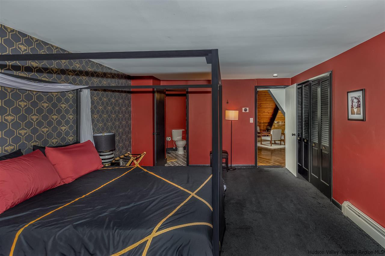 96 Lake Road Hunter, NY 12442 - Photo 25 of 35 a room with furniture and air hockey table