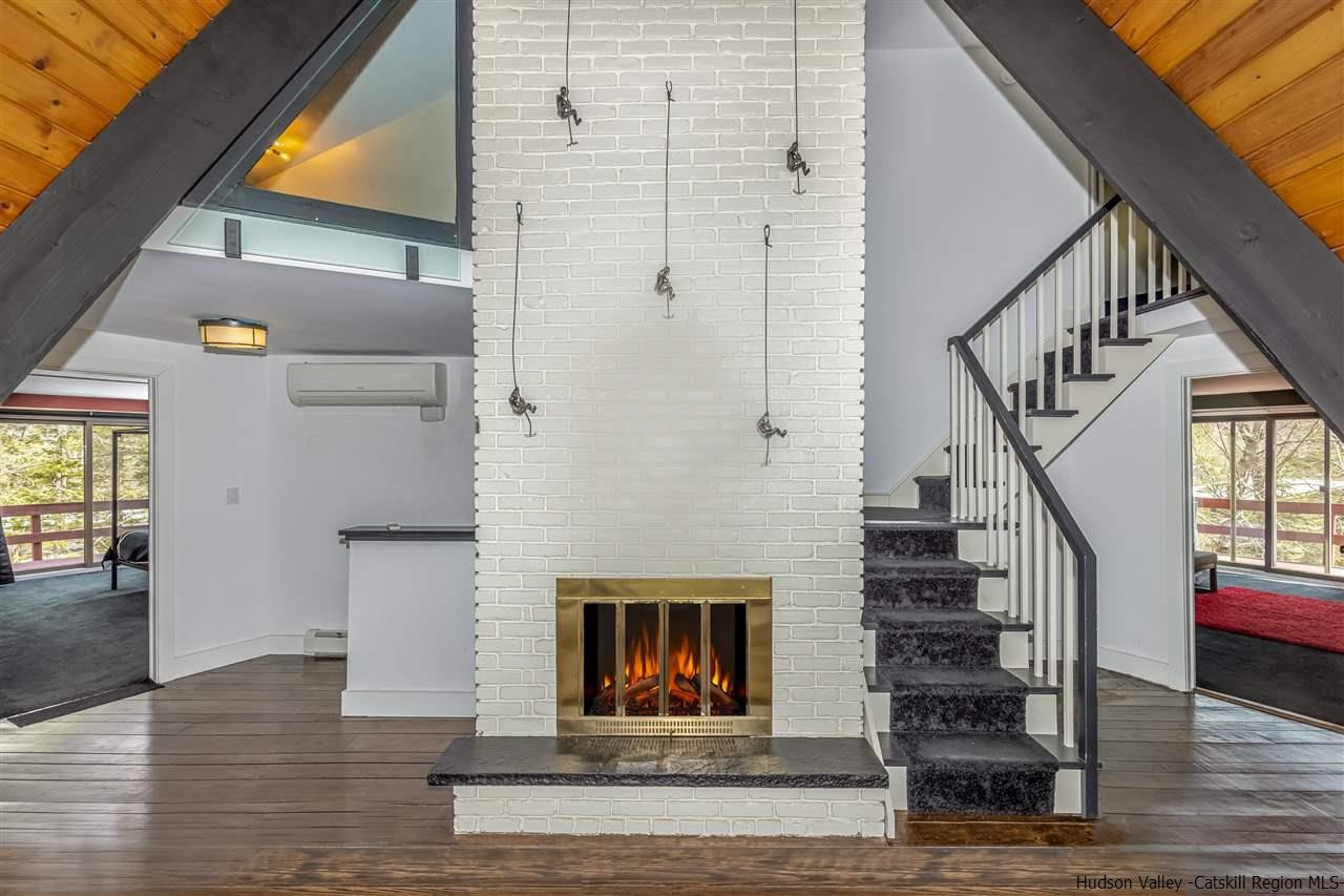 96 Lake Road Hunter, NY 12442 - Photo 5 of 35 a view of entryway and hall with wooden floor