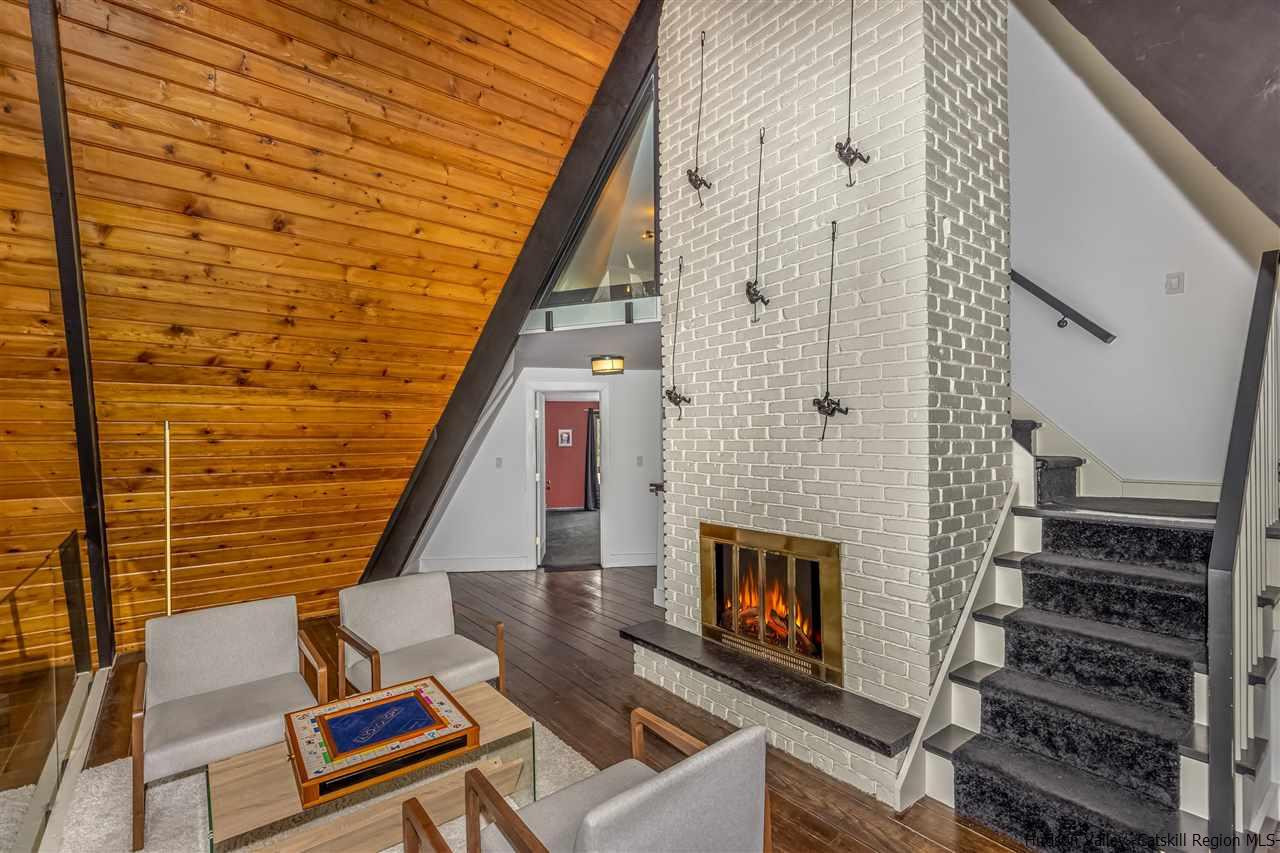 96 Lake Road Hunter, NY 12442 - Photo 6 of 35 a building with glass windows