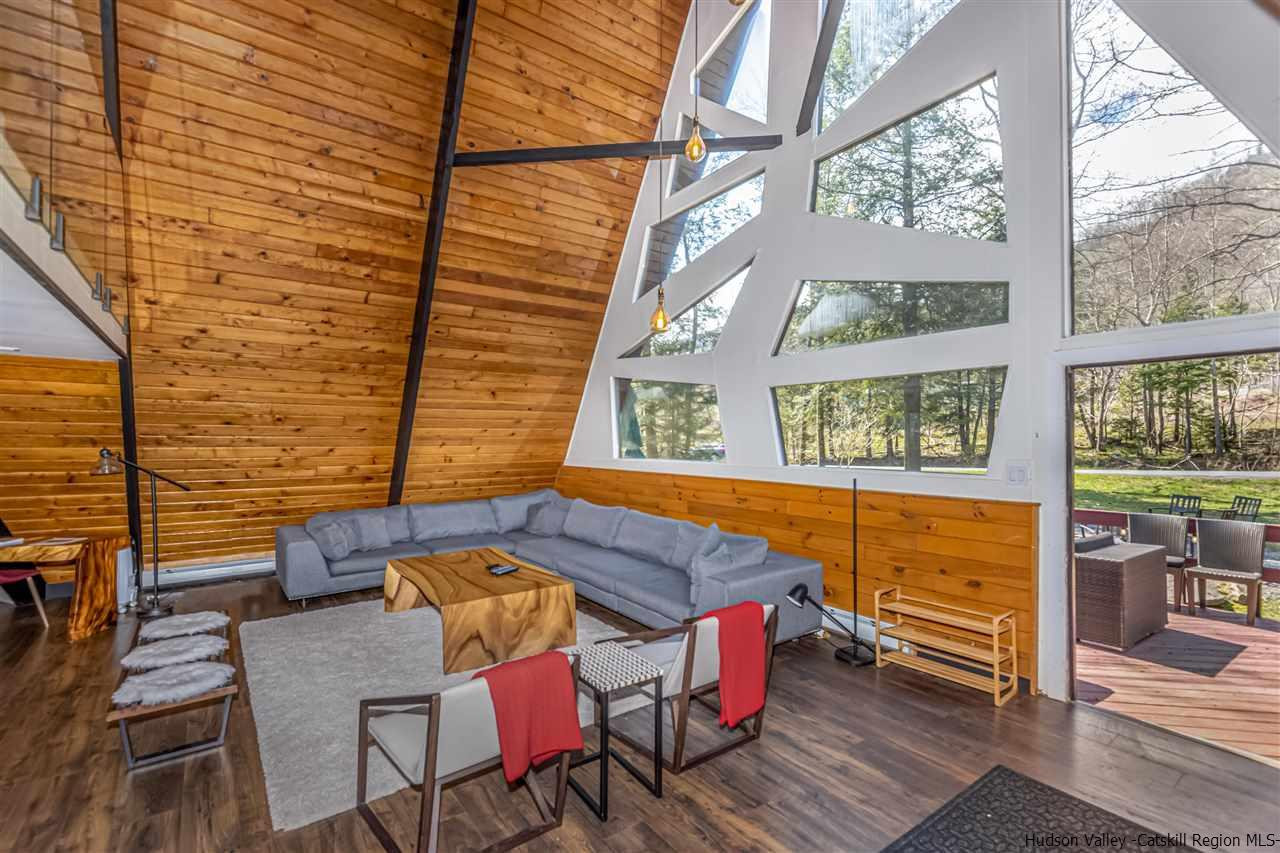 96 Lake Road Hunter, NY 12442 - Photo 7 of 35 a balcony with table and chairs