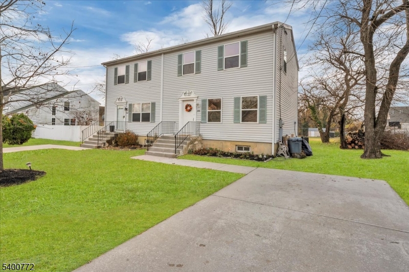 348 Silk Street Lawnside, NJ 08045 - Photo 2 of 24 a view of a house with backyard