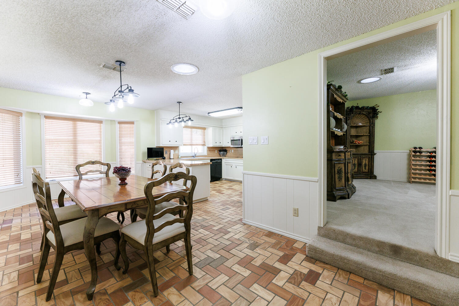 3713 95th Street Lubbock, TX 79423 - Photo 14 of 70 a view of a dining room with furniture