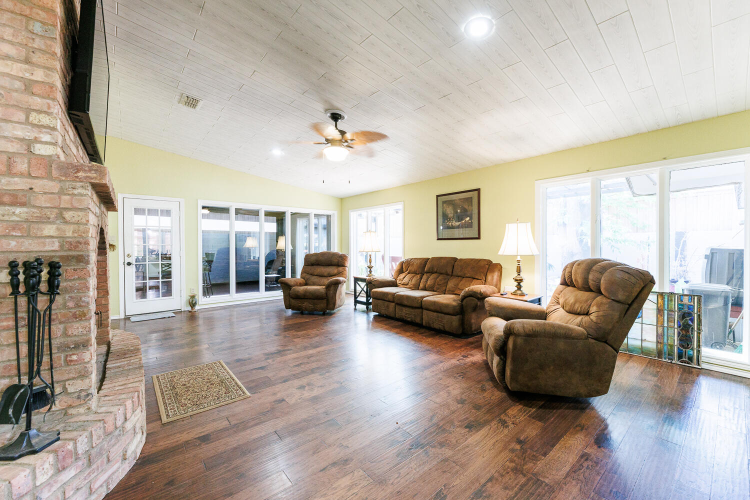 3713 95th Street Lubbock, TX 79423 - Photo 28 of 70 a living room with furniture and a large window
