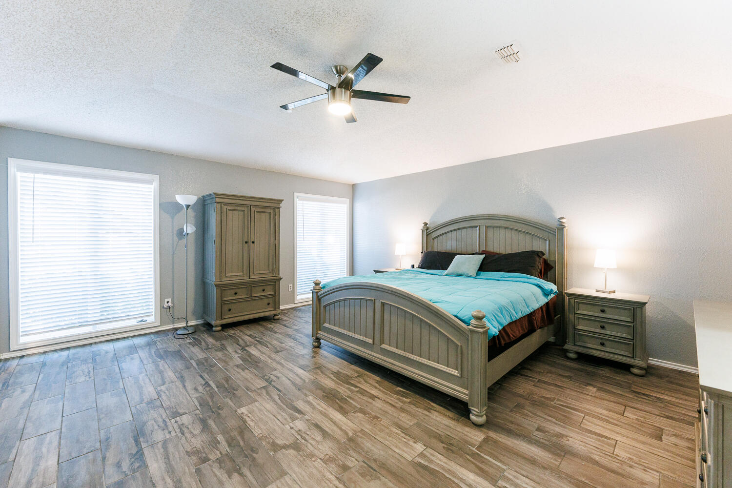 3713 95th Street Lubbock, TX 79423 - Photo 35 of 70 a bedroom with a bed and window