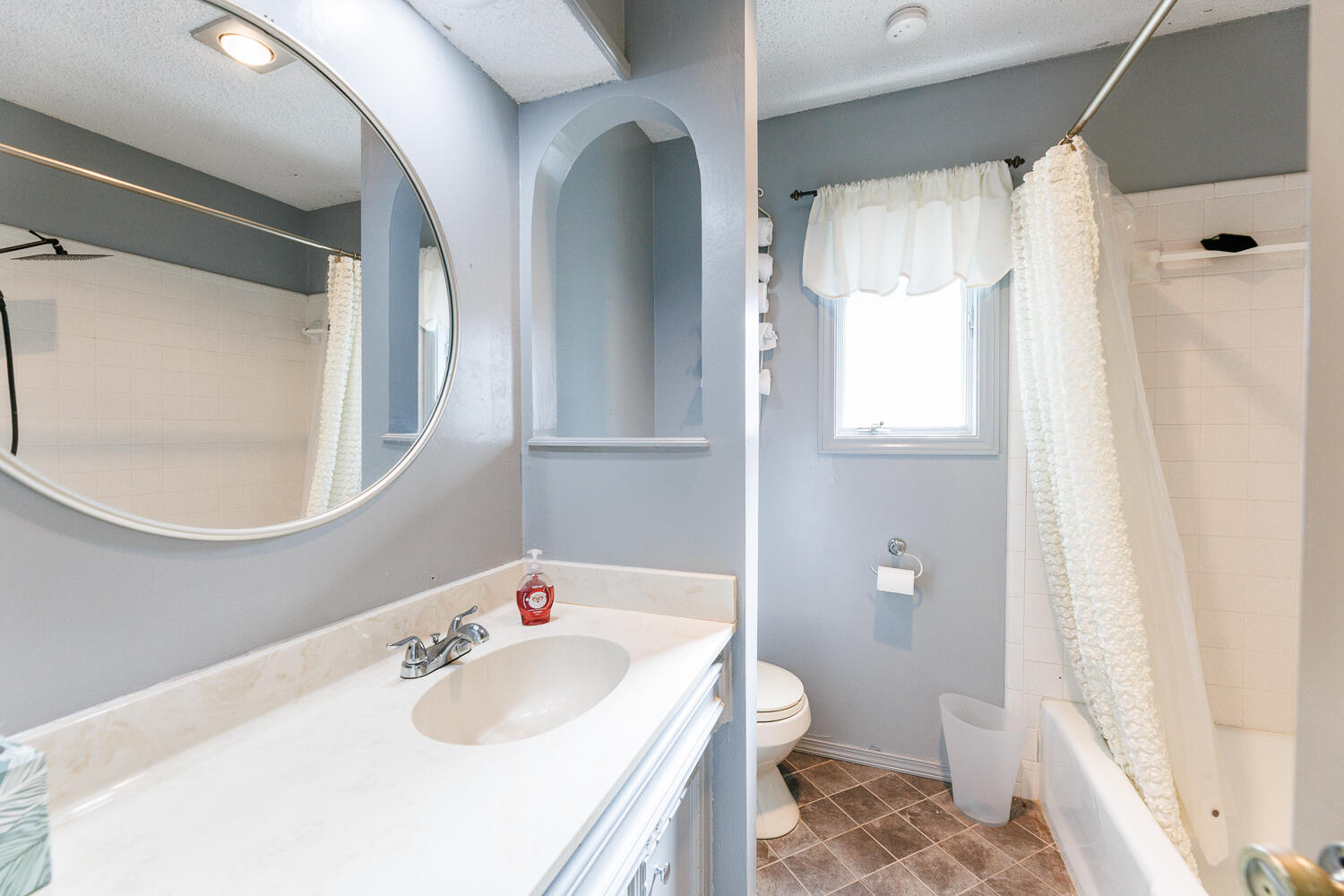 3713 95th Street Lubbock, TX 79423 - Photo 49 of 70 a bathroom with a sink toilet and shower