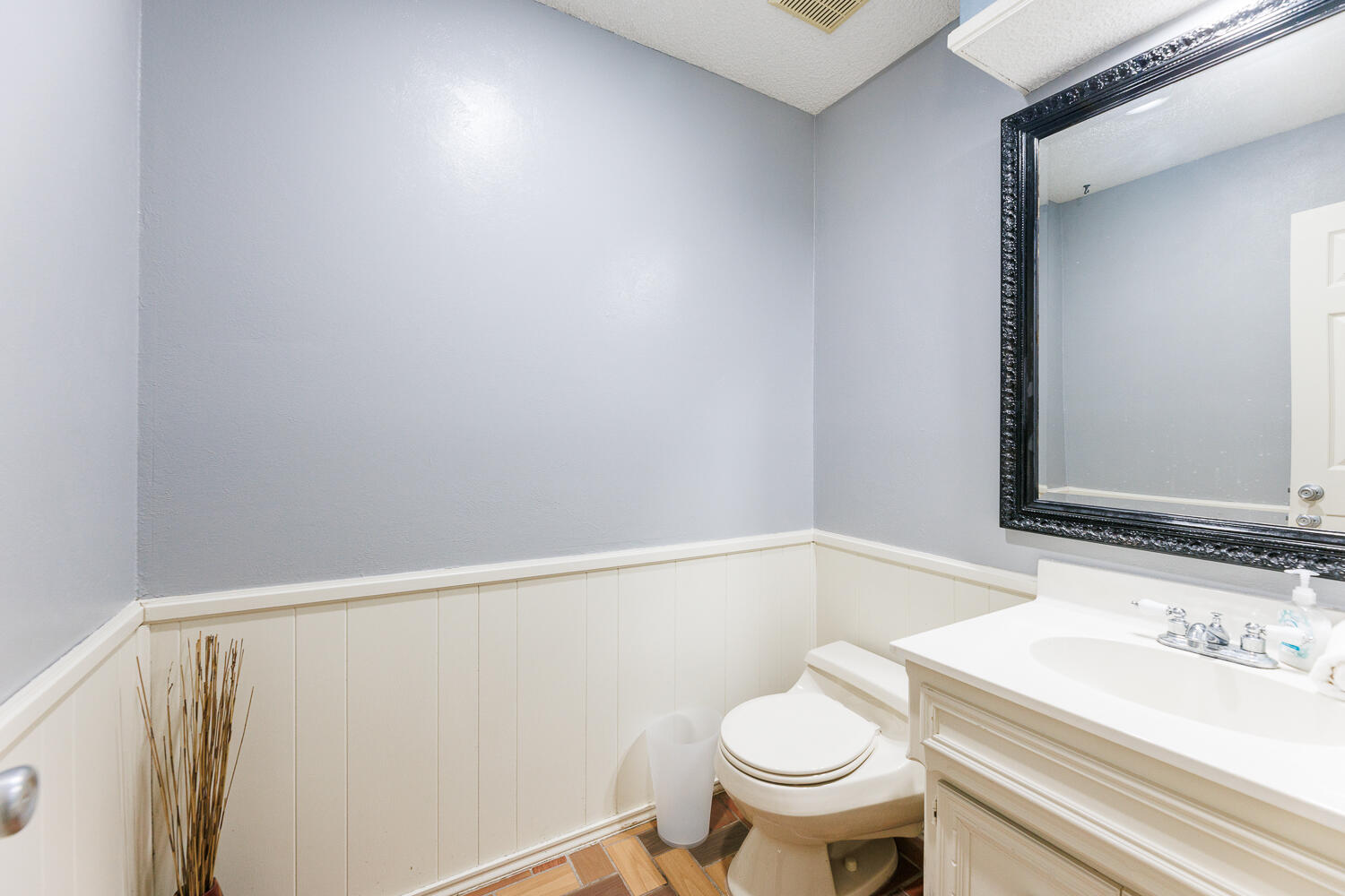 3713 95th Street Lubbock, TX 79423 - Photo 54 of 70 a bathroom with a sink and a toilet